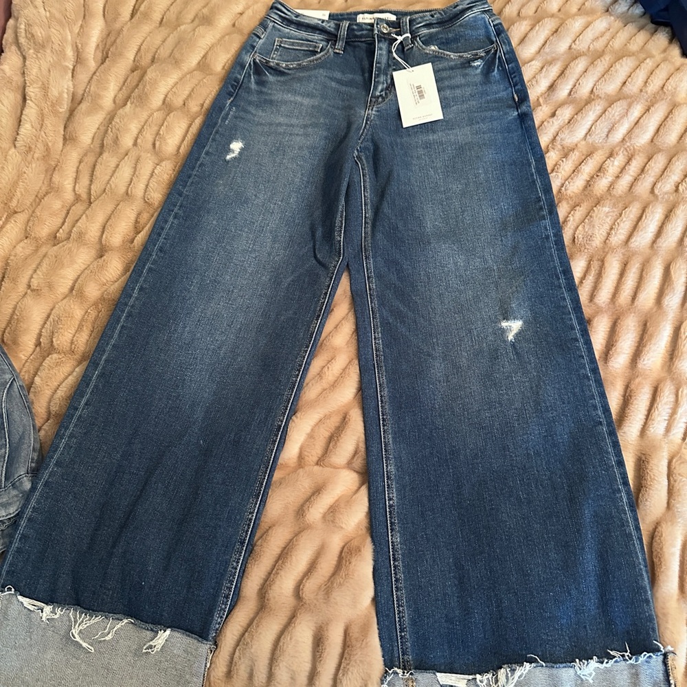 Wide-Leg Distressed Blue Jeans with wide cuff